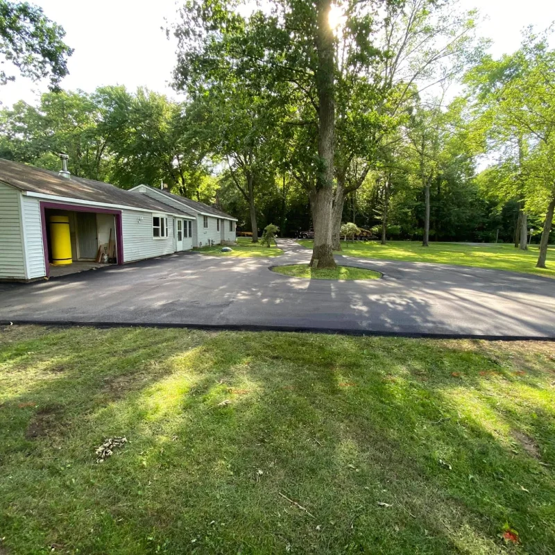 new asphalt at house front